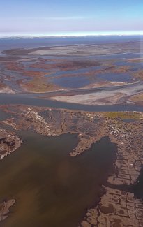 Photo of the tundra and Arctic Ocean from a flight over Alaska.